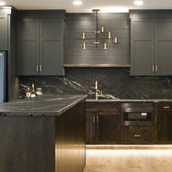 Dark Wood Kitchen with chandelier 